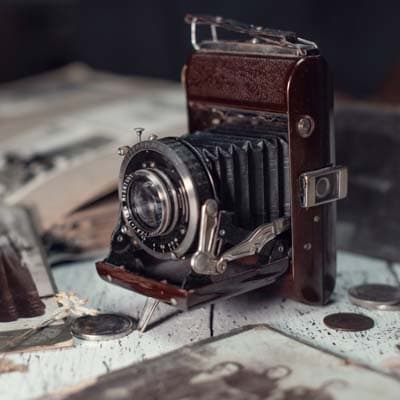 Professional camera equipment representing original website production