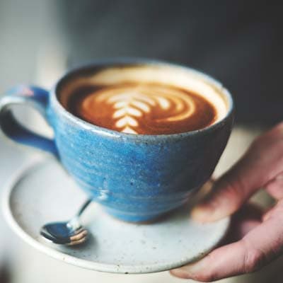 Planning materials and coffee on a working desk